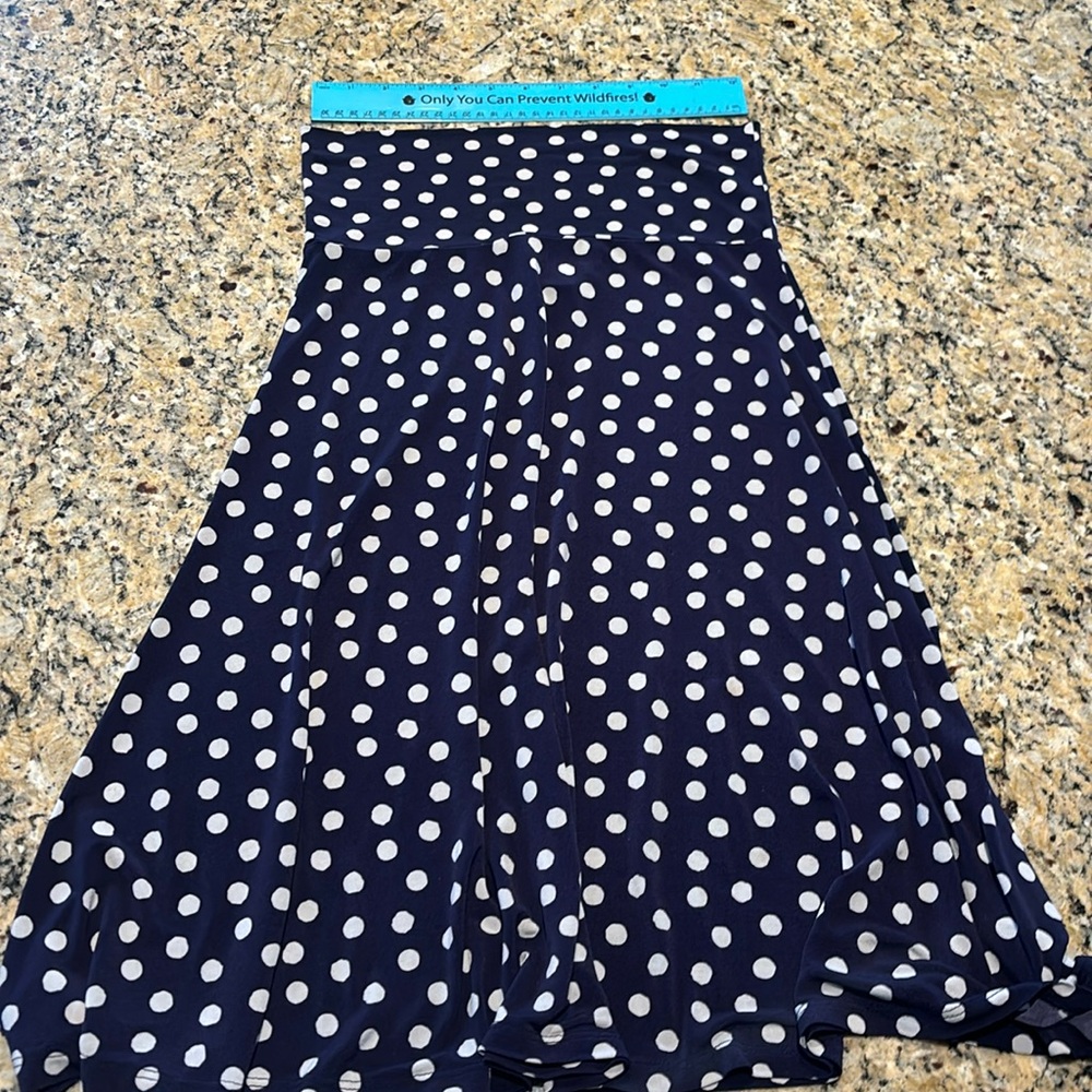 Purple with polka dots. Skirt